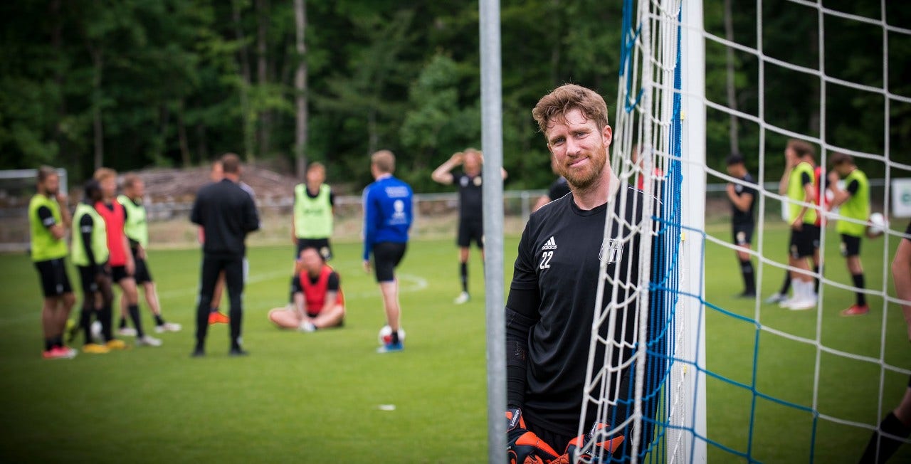 employee on soccer field